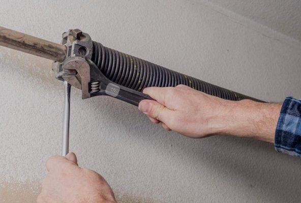 Garage door sprig repair