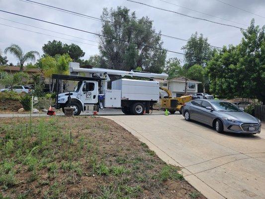 Illegally blocking my driveway with notice or permission. Didn't perform services nor were contracted by anyone in my home.