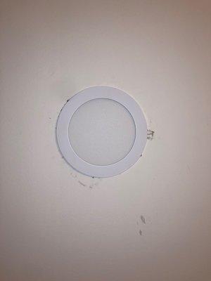 Scratches and cuts in ceiling around lights