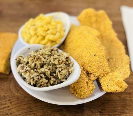 Entree: Fried catfish with sides of dirty rice, Mac and cheese, and cornbread.