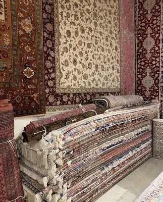 100% silk rugs in a variety of colors and designs.