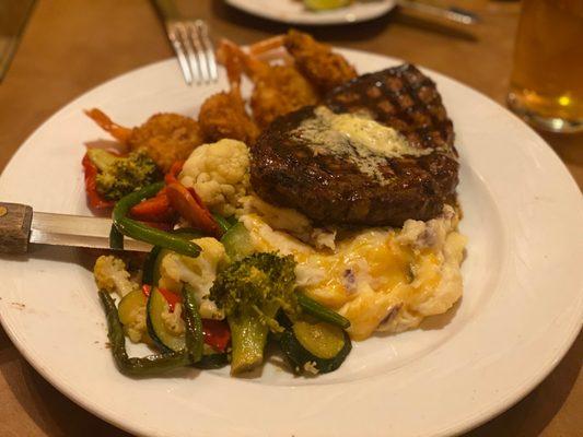 Steak, cheesy mashed potatoes, mix veggies