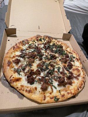 Sausage and onion white pizza