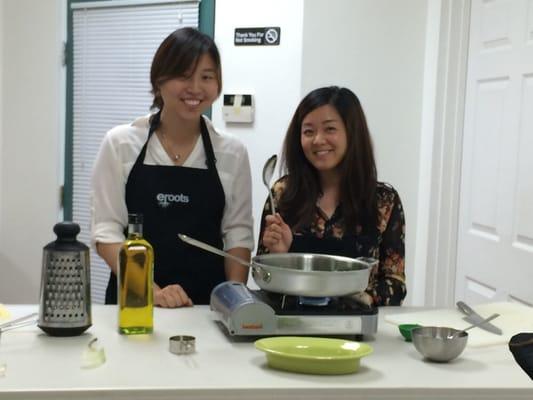 Students having fun making sautéed kale