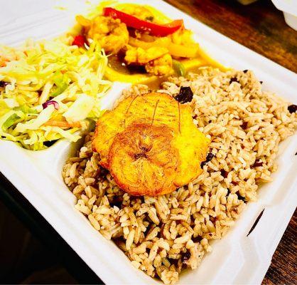 Coconut Shrimp Curry with Haitian Rice, spicy Coke Slaw, and fried Plantain.