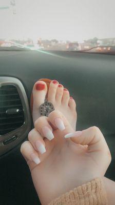 White ombré acrylic nails and gel toes.