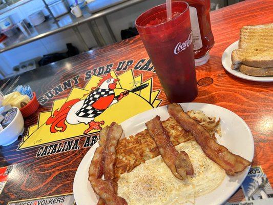 Breakfast anytime so delicious crispy bacon over medium wheat toast. Yum