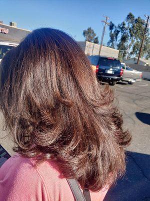 Hair by Mel. Amazing color and cut.  Exactly what I asked for.  Covered my grey hair and shaped my curly hair to perfection.