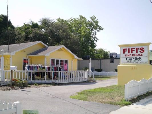 Yellow cottage with the white picket fence