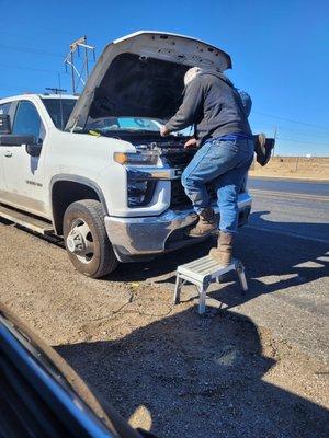 Putting the serpentine belt back on