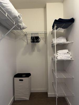 Walk in closet. You will have some extra towels and pillows. They also provide plenty of hangers