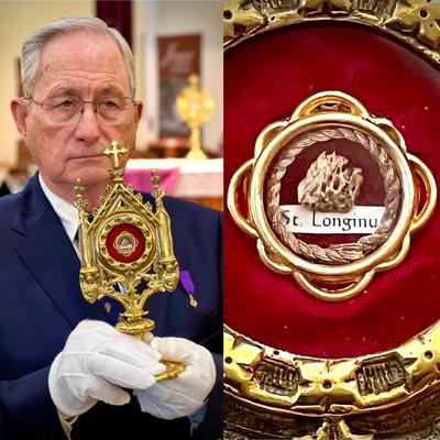 Knight of Columbus holding a first class bone relic of St Longinus who was the Roman Centurion that put the lance in the side of Jesus