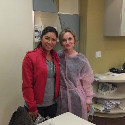 Our hygienist, Olga, with her patient.