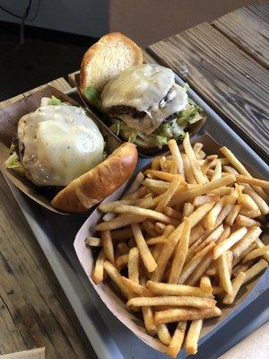 Large basket of fries and two mushroom jalapeño burgers