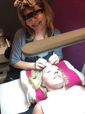 Stephanie Bond providing an incredible service to give me fuller lashes.