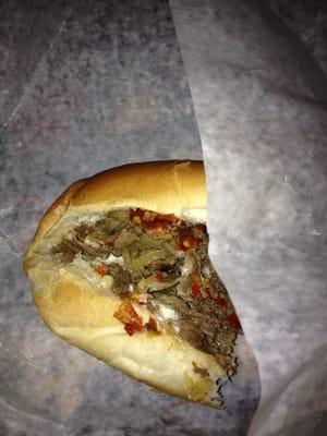 Cheese steak with hot pepper relish,mayo,mushrooms and onions!! Heaven on a bun!!