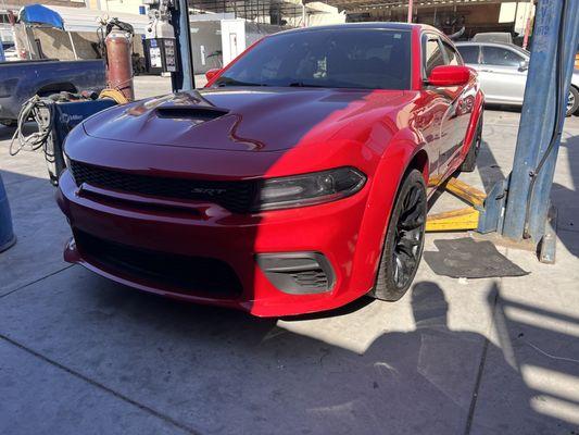 SRT 8 transformer to wide body Hellcat what a new look for this 2016. Call Paul at Glamis Auto Body . 562 386-3961