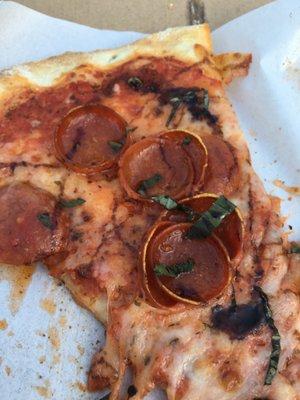 Pepperoni with balsamic glaze drizzle and basil