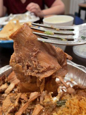 Massive piece of inedible pork skin in my carnitas.  I only received two small, decent pieces of meat with my entire dinner.  Unacceptable.