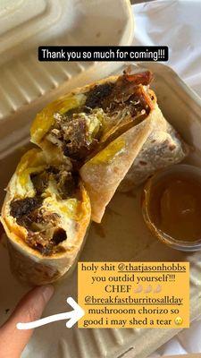 Mushroom chorizo breakfast burrito with scrambled eggs.