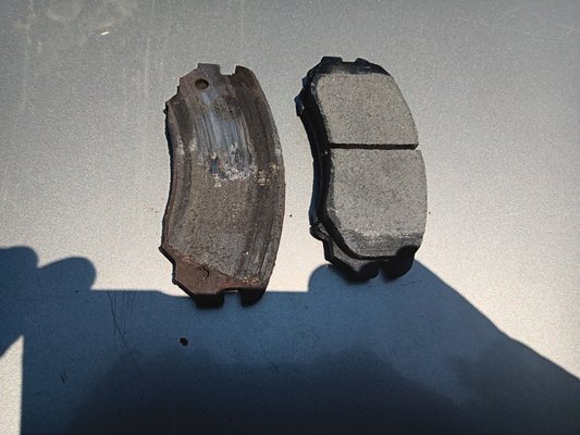 Old and new brake pads