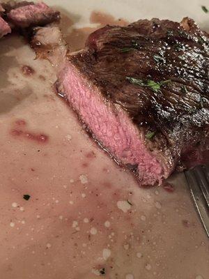 New York strip cooked medium