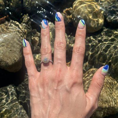 Gel nail design Seattle Seahawks-inspired