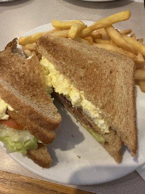 Egg salad club with fries