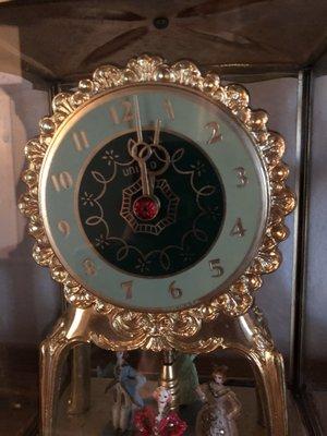 A crooked face on the clock. This is what he did to an antique clock. It wasn't brought to him in this condition.