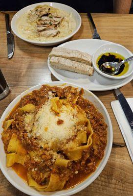 Bread, Chicken Alfredo and Pappardelle with beef and pork sauce and mozzerella. The servings are very large!The olive oil cake was amazing!