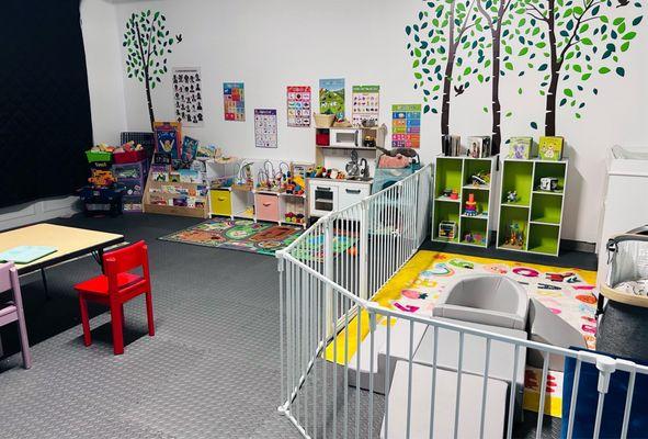 Main playroom with separate infant space.