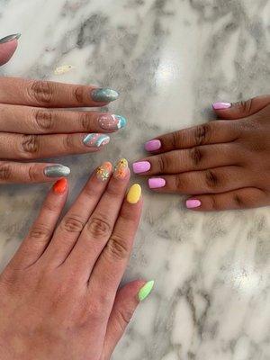 Spring/Easter nails.. I got 6 different colors and my friend got magnetic gel with a cloud/rainbow design.