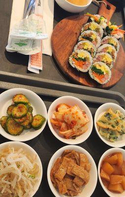 Ham Kimbap and complimentary side dishes.