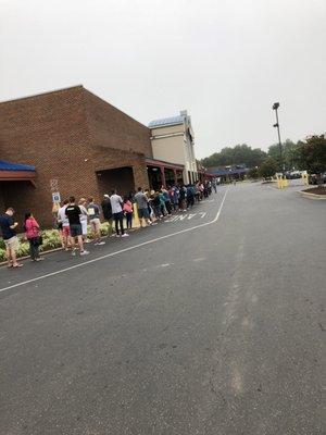 This is 8:30 am! Shame on you NC DMV! In case you can't see line goes around building and towards back.