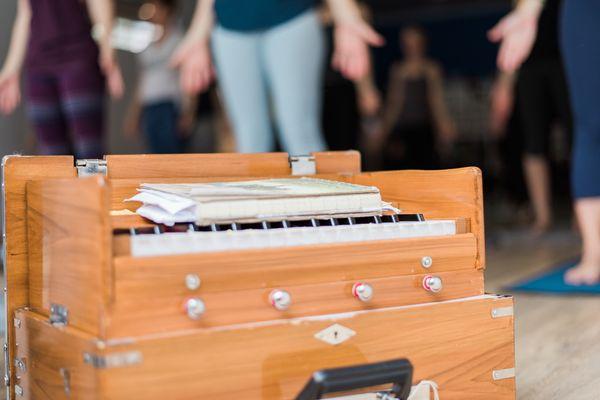 Bhakti flow class with harmonium.