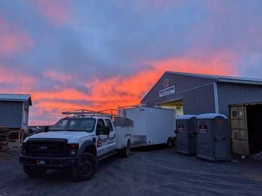 Lewisburg, PA picturesque sunset over roofers shop