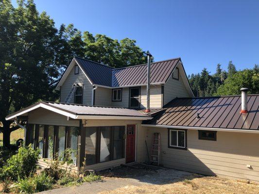 We love how this brown metal roof turned out on this home in Jewel, OR