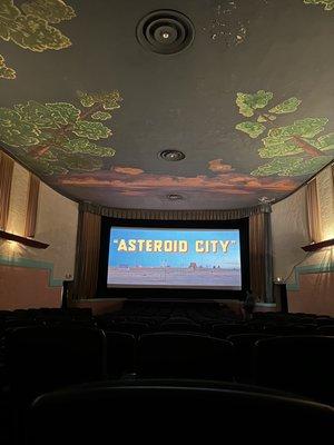 The Elk Rapids Cinema is a 300-seat art deco movie house with the world's largest black light ceiling mural.