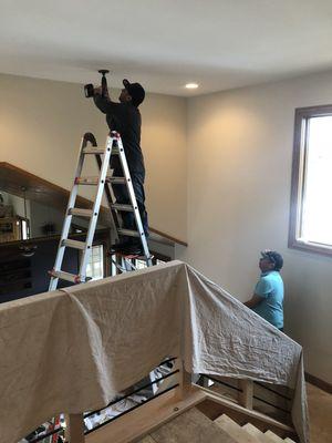 2 story chandelier install