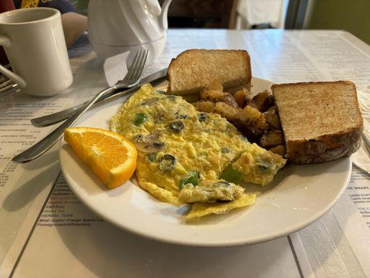 Custom omelet , potatoes, and toast on the new menu