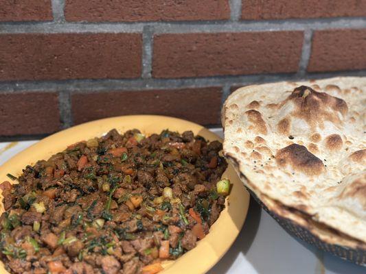 lamb ghallaba with rashoosh flat bread