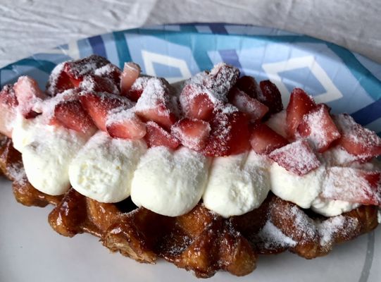 My strawberry croffle. A cross between a waffle and croissant, topped with whipped cream and strawberries. Pure genius!