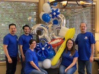 Celebration of 33 years in practice. Congratulations Dr. Louis Orsatti Our Texas dentist enjoying some balloon  time.