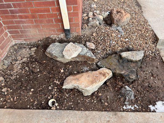 The large rocks used to go around the concrete & the small pebbles are were on top of dirt. This is how they "put back my landscaping"