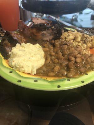 Brisket, ribs, sausage, potato salad, beans, and brisket macaroni and cheese