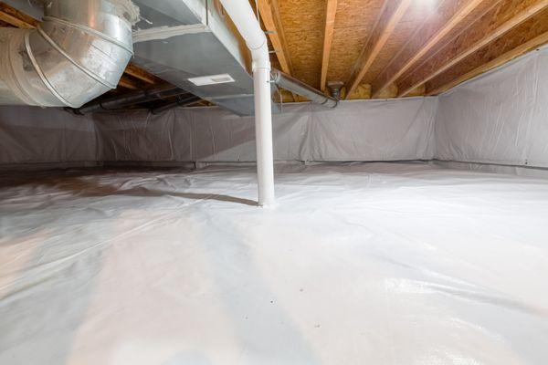 A finished crawl space encapsulation project using high quality fiberglass insulation.