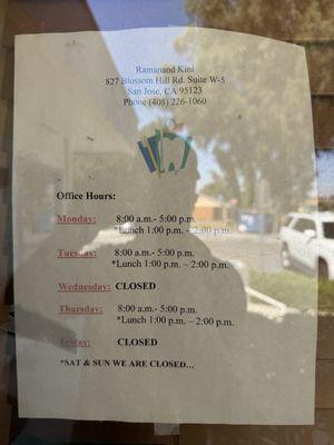 Open hours posted next to front entry door