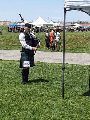 A bagpiper in the Colorado Youth Pipe Band competes in a solo bagpiping competition.