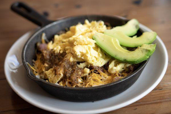 Southwest Skillet | Smoked Brisket, Sliced Avocado, Onions, Jalapeños, and Salsa