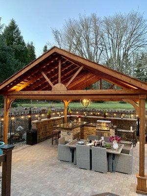 Pavilion, pavers, bbq station with bar seating